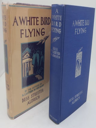 A WHITE BIRD FLYING