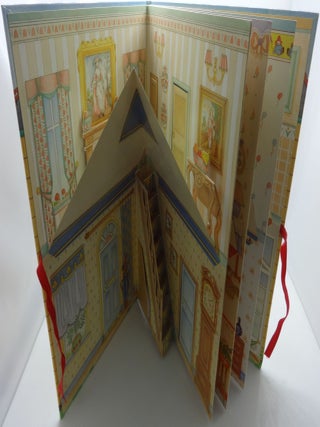 A VICTORIAN DOLL HOUSE