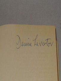 THE POET IN THE WORLD (SIGNED)
